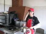Adriana working in the local Pizzeria. 