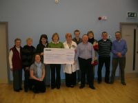 Fionuala and Maureen present SFR with the cheque. 