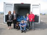 Van packed with food and some volunteers after a hard day's shopping!