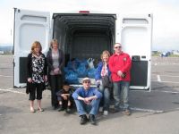 Van packed with food and some volunteers after a hard day's shopping!