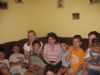 Aodheen surrounded by the children in our second house