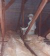 Laying the loft insulation; not a pleasant job!!